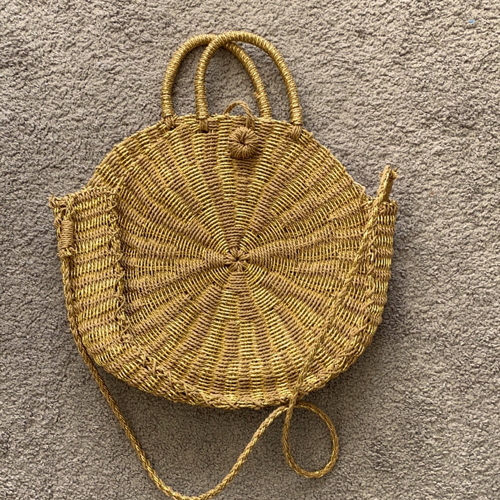 Straw and gold purse